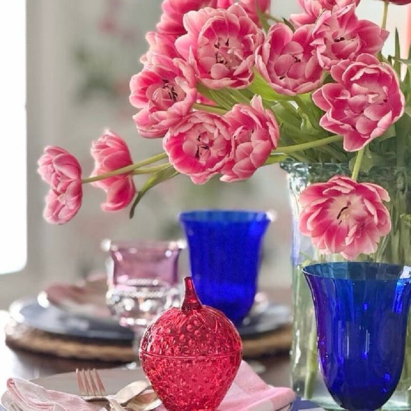 pink peony tulips and blue glasses