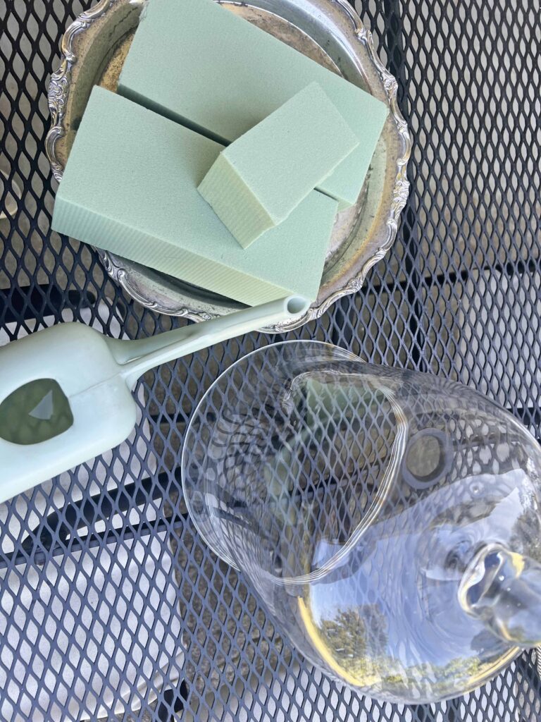 how to create a glass cloche display with fresh fern fronds