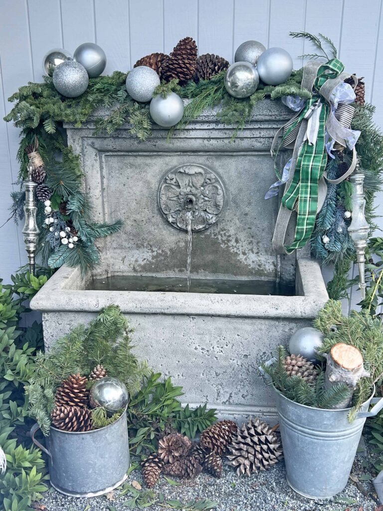 how to decorate an outdoor fountain for Christmas