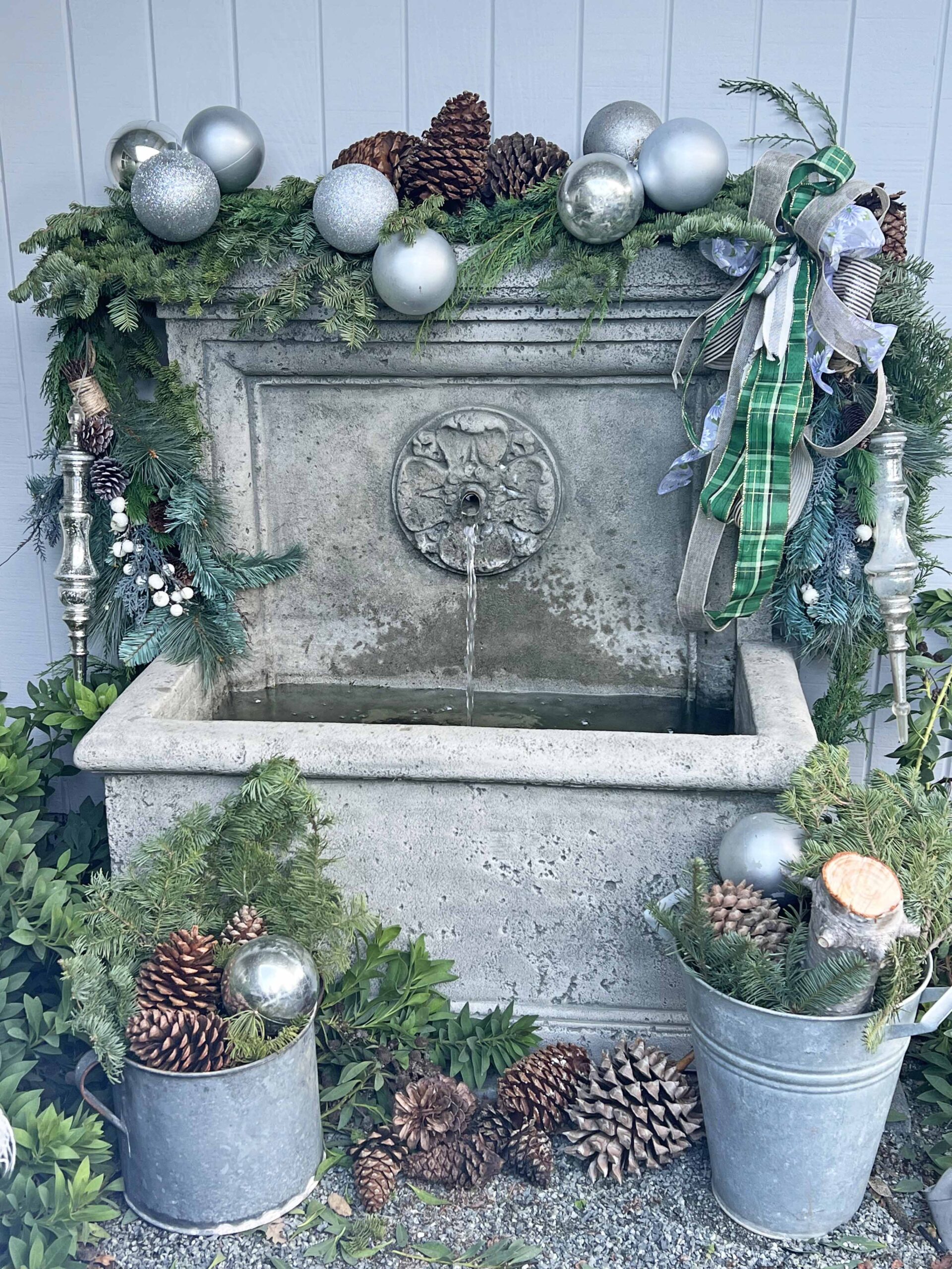 how to decorate an outdoor fountain for Christmas