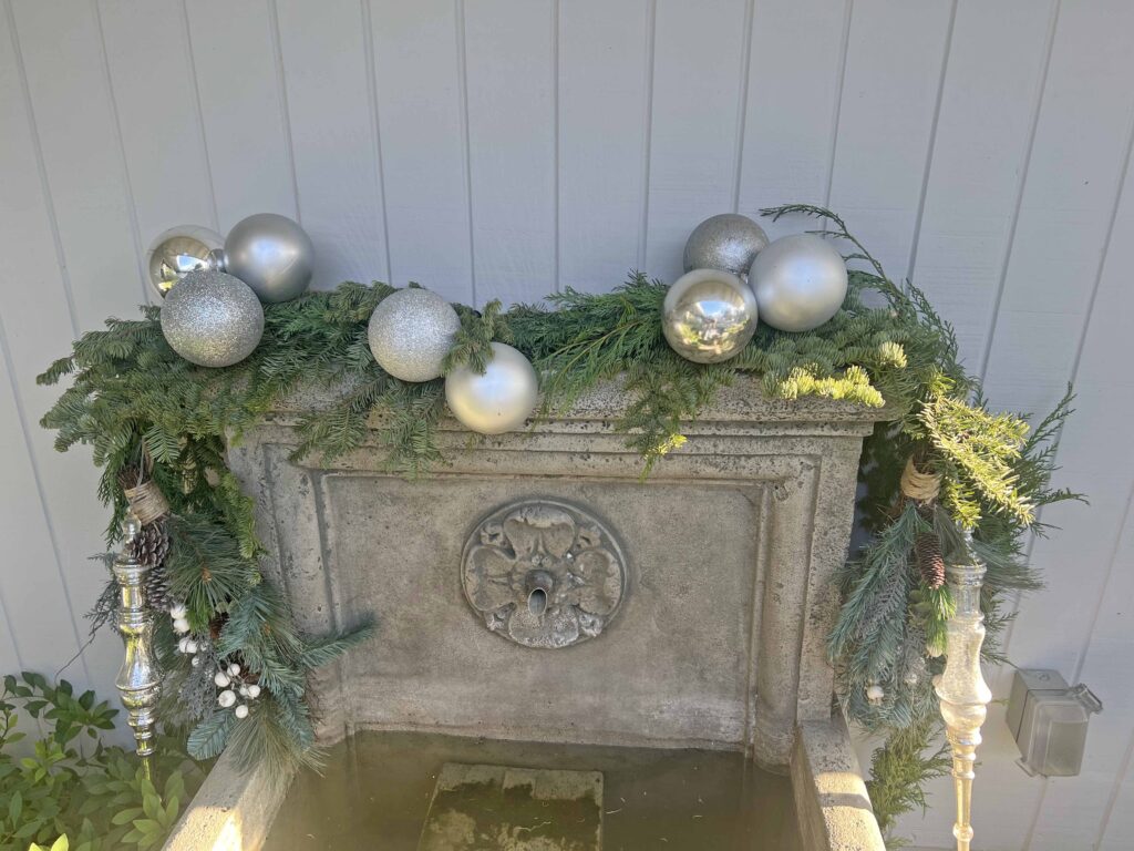 how to decorate an outdoor fountain for Christmas