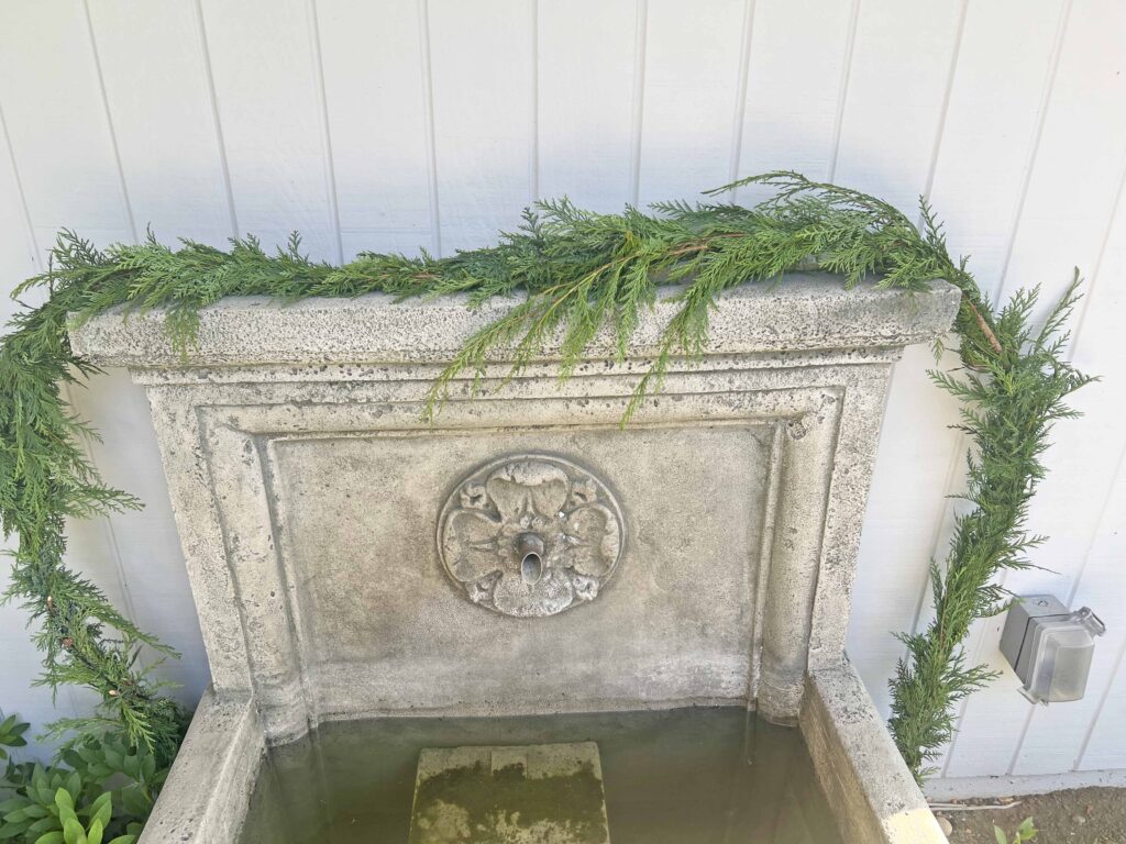 how to decorate an outdoor fountain for Christmas