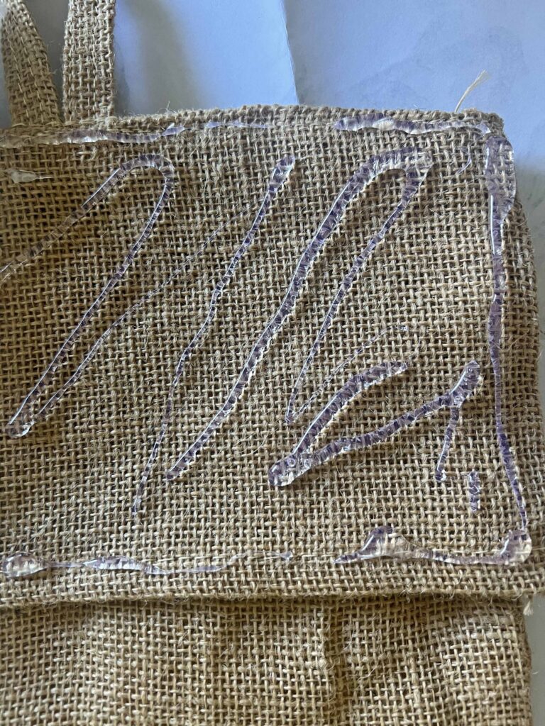 easy Christmas stocking upcycle using Dollar Tree supplies