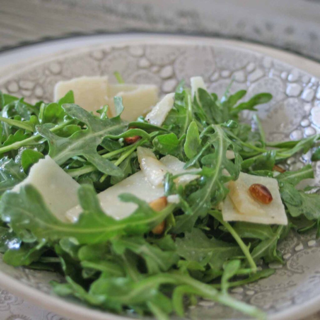 simple arugula salad with parmesan cheese and pine nuts recipe