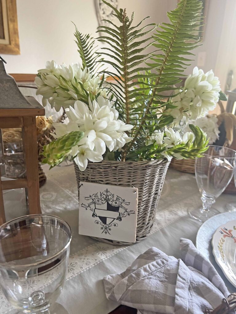 How to Create a Unique Floral Table Setting with Thrifted Baskets Star of Bethlehem ferns Floral Basket