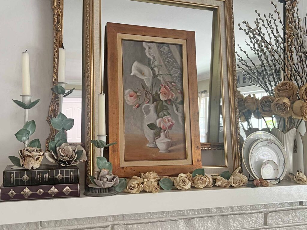 Summer fireplace mantel styling: A vintage rose inspired display for a collected home - angled mantel shelf