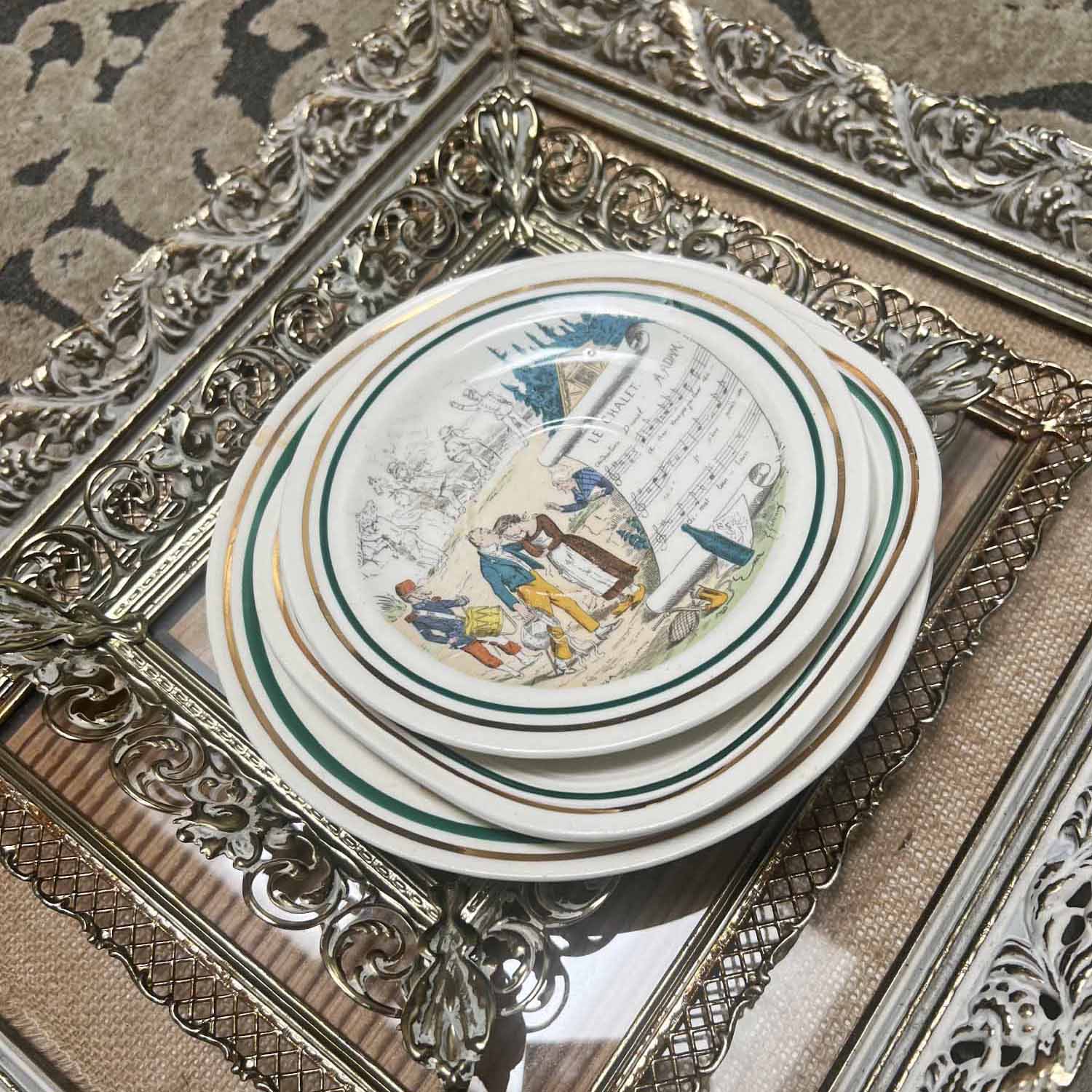 how to curate a gallery wall with thrifted collections French Opera Plates and metal gold filigree frames
