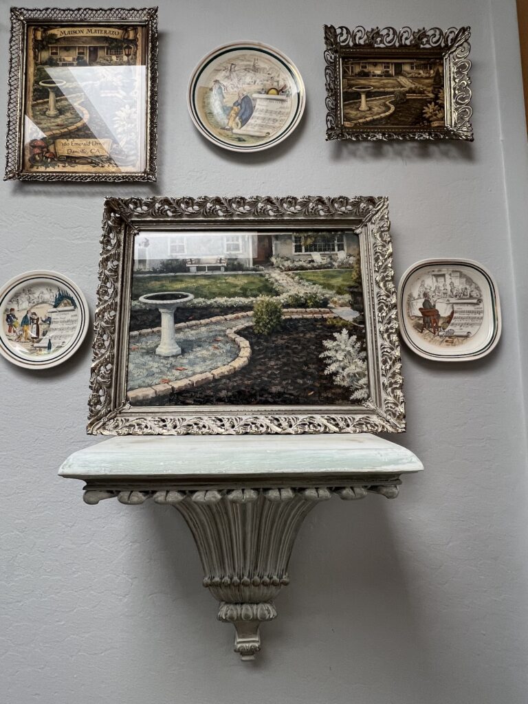 how to curate a gallery wall with thrifted collections full wall