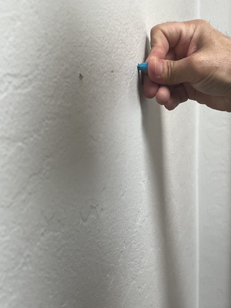 how to curate a gallery wall with thrifted collections screw anchor