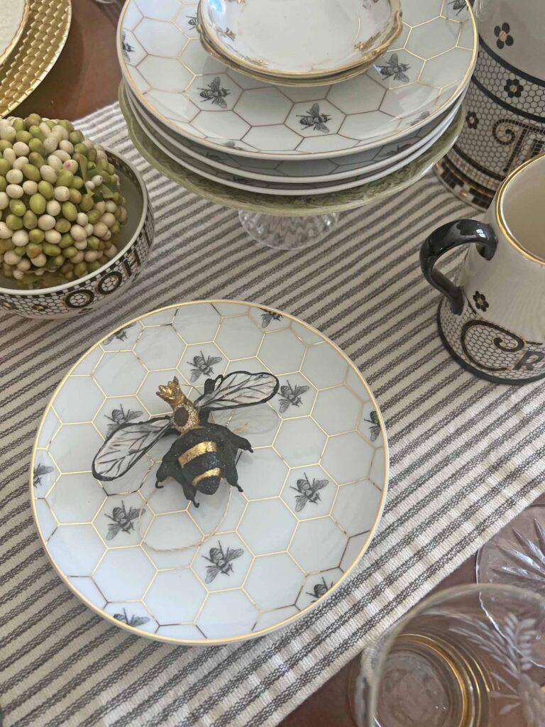 The bee's knees table setting bumble bee close up on WS honeycomb plates