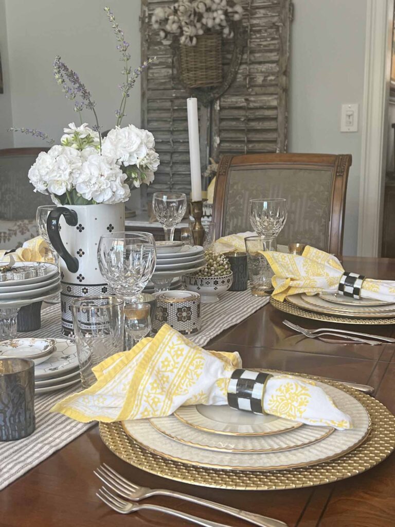 The bee's knees table setting angled table towards sideboard place setting details