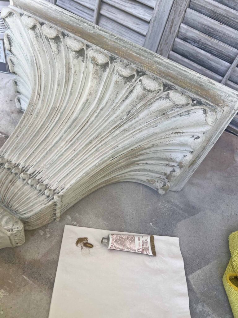 Thrift Flip: How to Up-cycle a thrifted wall sconce shelf to match your decor gilding