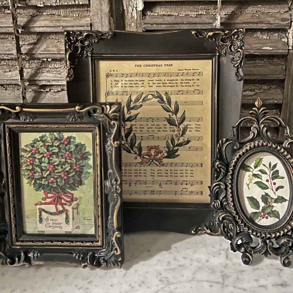 Up-cycled thrifted frames with Christmas artwork