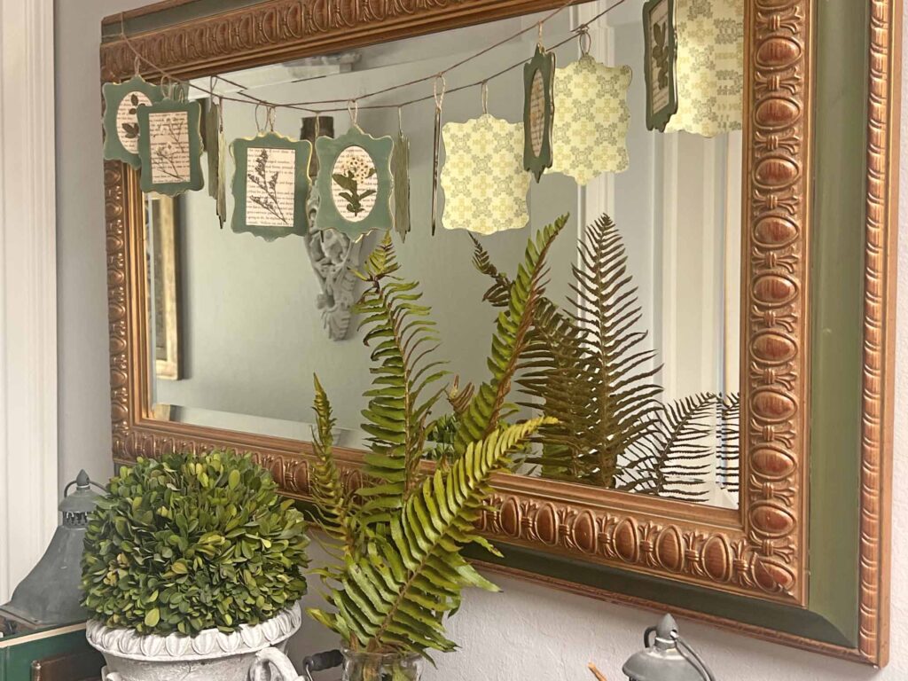 botanical summer decor vignette in the foyer angled fern reflection