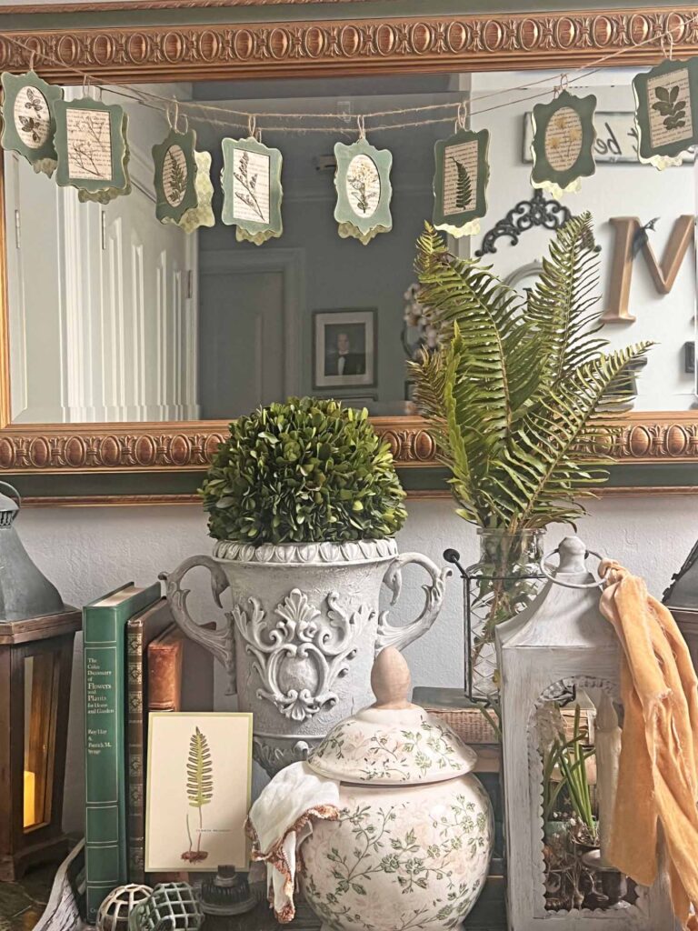botanical summer decor vignette in the foyer full length