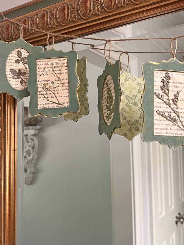 Summer craft: Botanical pressed flower garland DIY hanging on mirror with backside refection