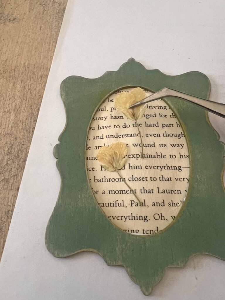 Summer craft: Botanical pressed flower garland DIY adhering floral on book pages