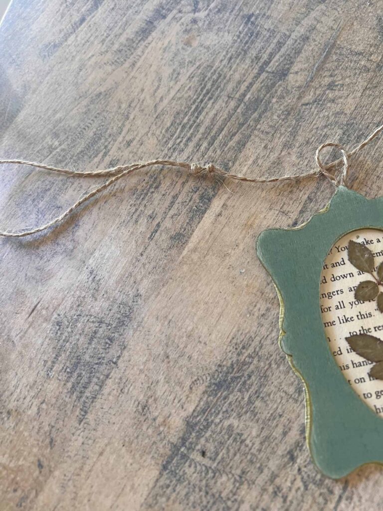 Summer craft: Botanical pressed flower garland DIY hanging twine tie off