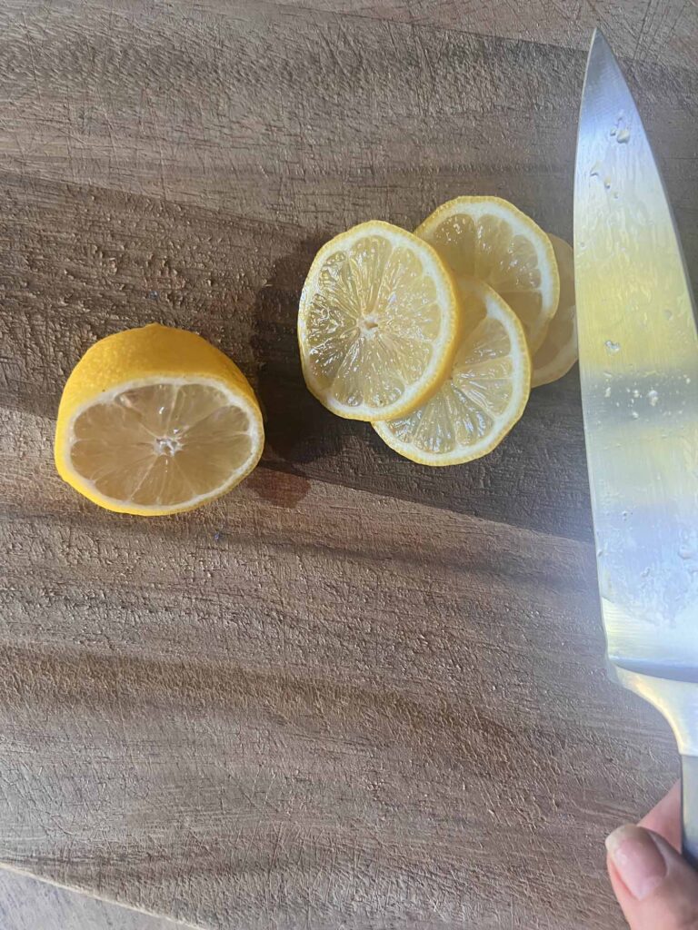 how to create a pretty pest repellent bowl slicing lemons