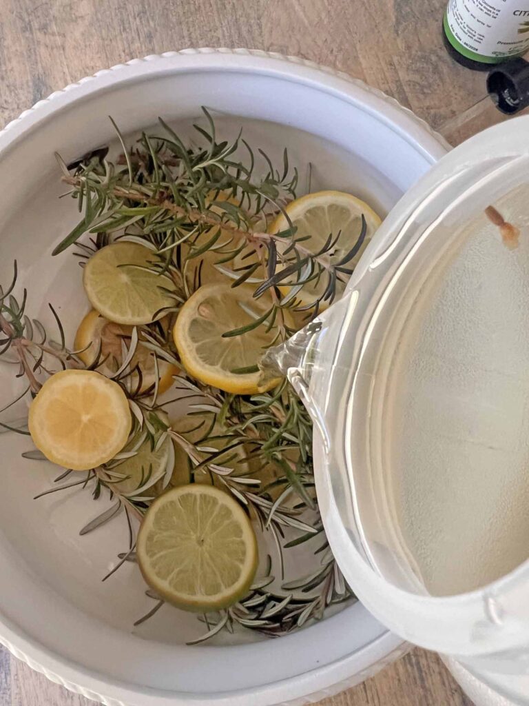 how to create a pretty pest repellent bowl pouring water