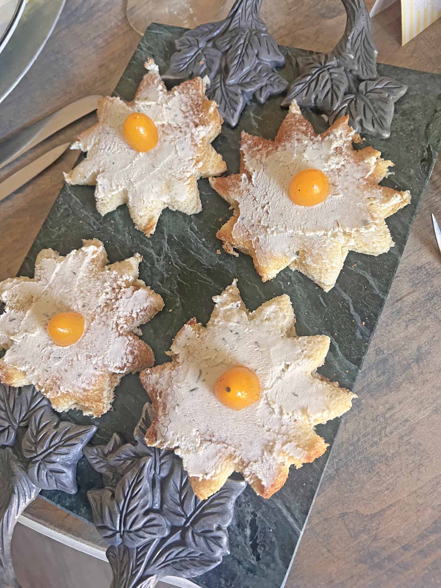 Oopsie daisy inspired tablescape Boursin canapé on marble board