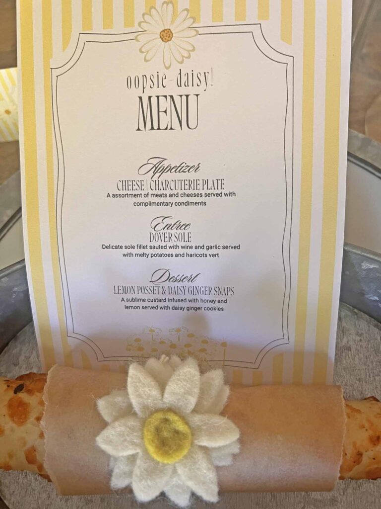 Oopsie daisy inspired tablescape menu close-up