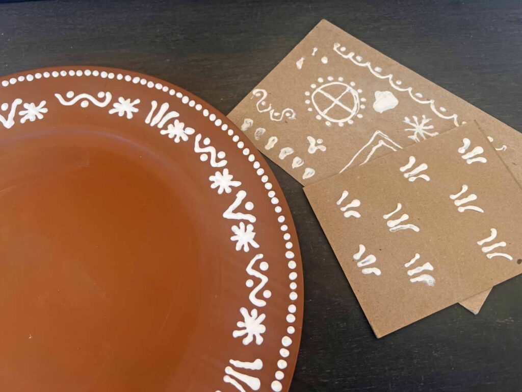 Christmas Craft: Gingerbread plate charger DIY {a la Pottery Barn} puffy paint scroll practice
