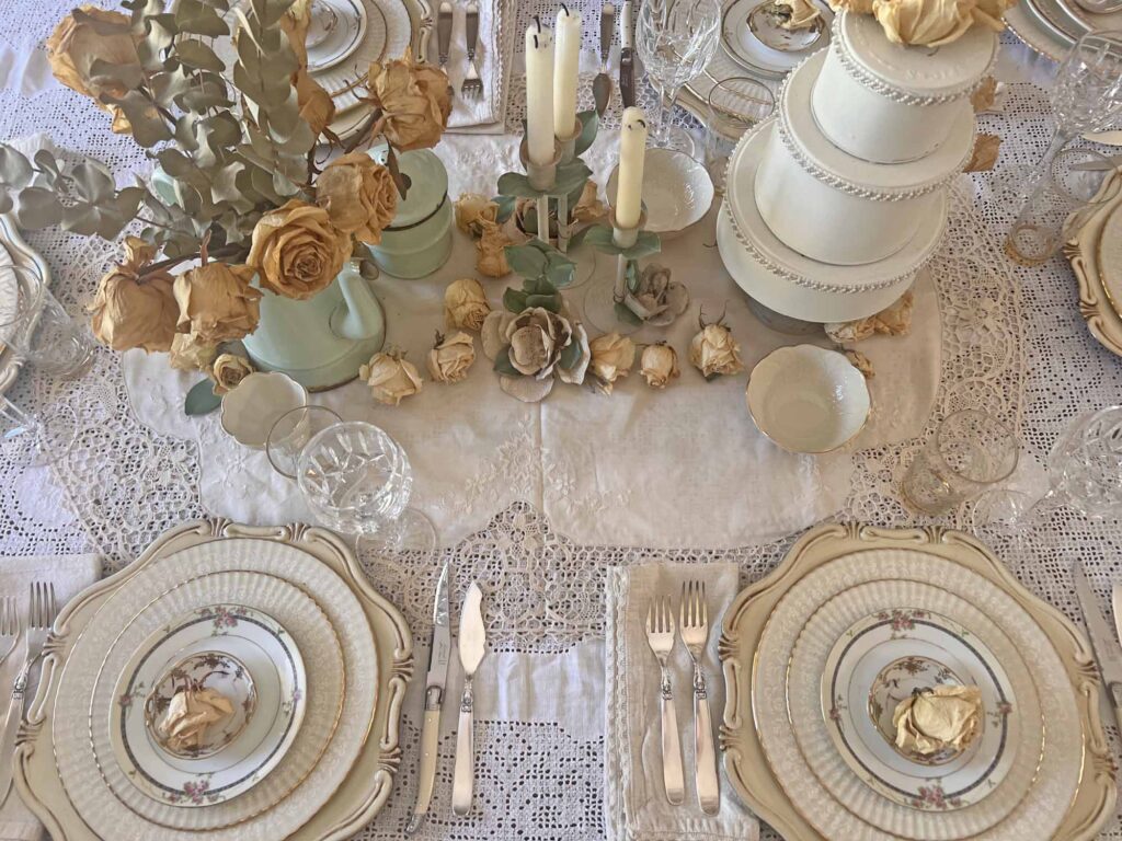 Stop & smell the roses summer tablescape place settings on side of table