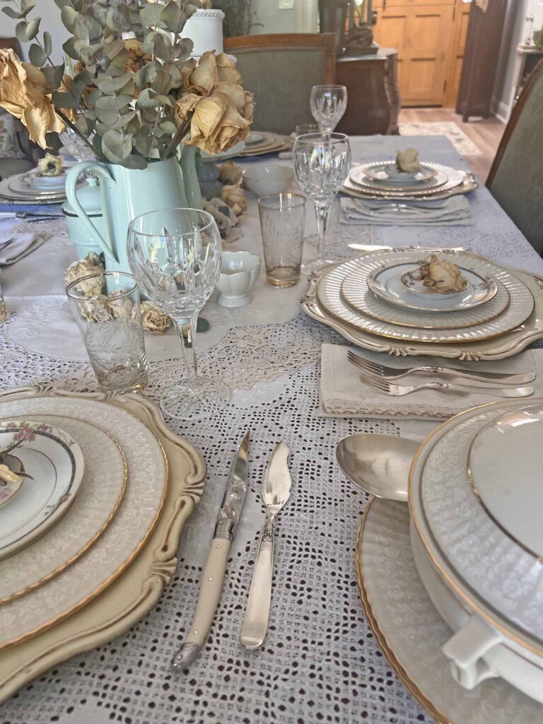 Stop & smell the roses summer tablescape place setting down the table towards foyer