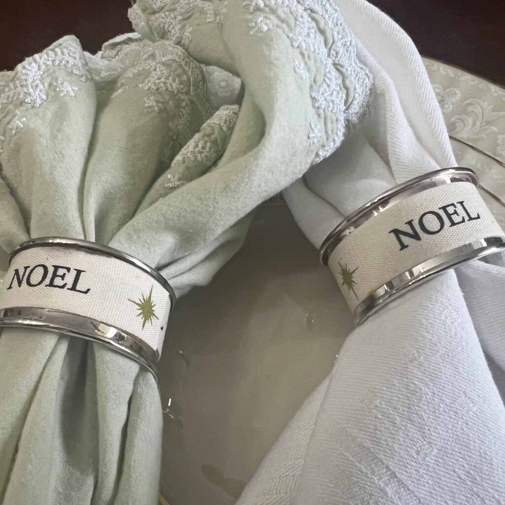 Christmas glow-up silver napkin ring decorated with ribbon
