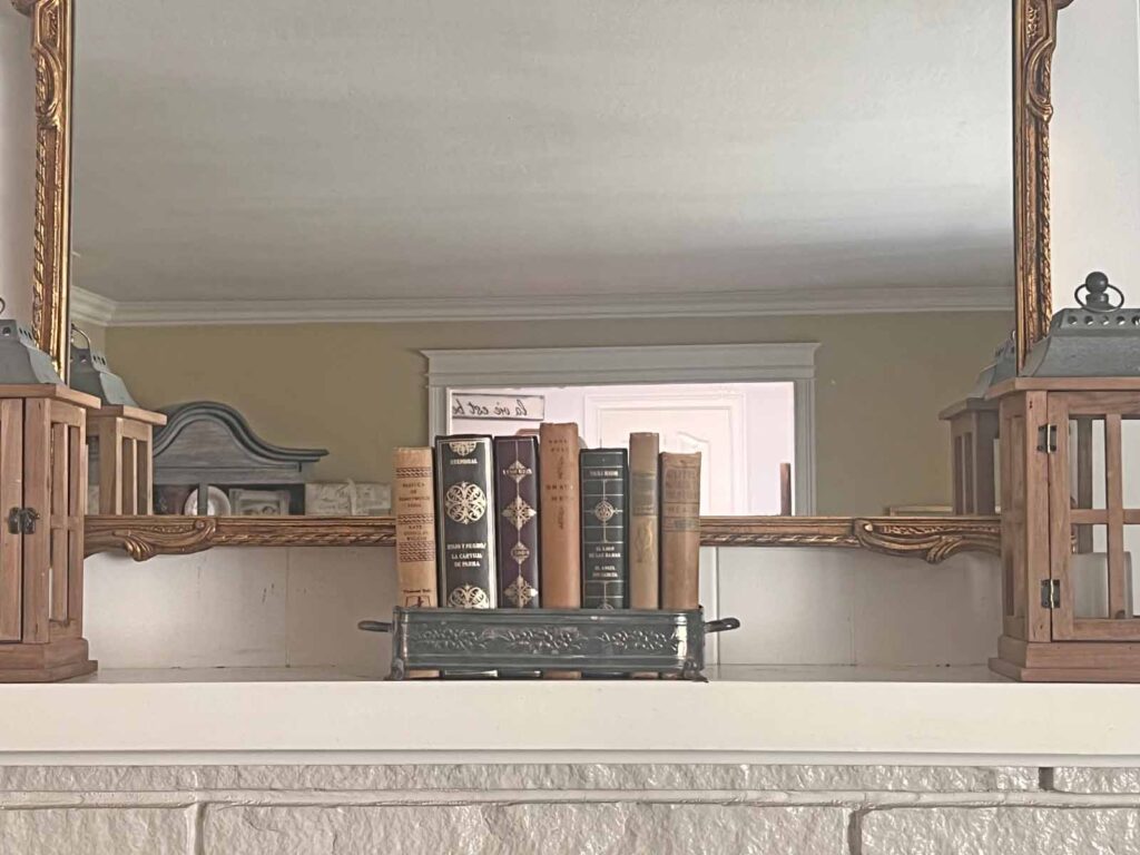 Fall Mantel Decor: Embracing the Essence of Fall Slowly- books in silver as central focal point