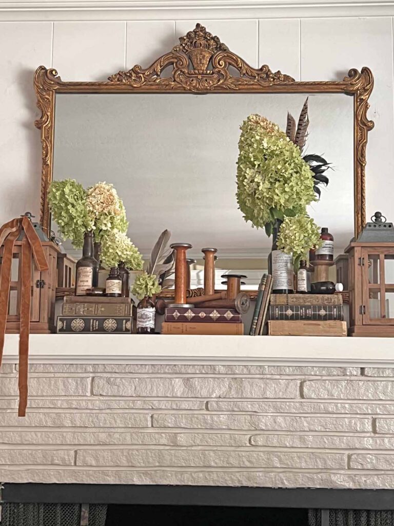 Fall Mantel Decor: Embracing the Essence of Fall Slowly- added velvet ribbon and feathers finishing touches