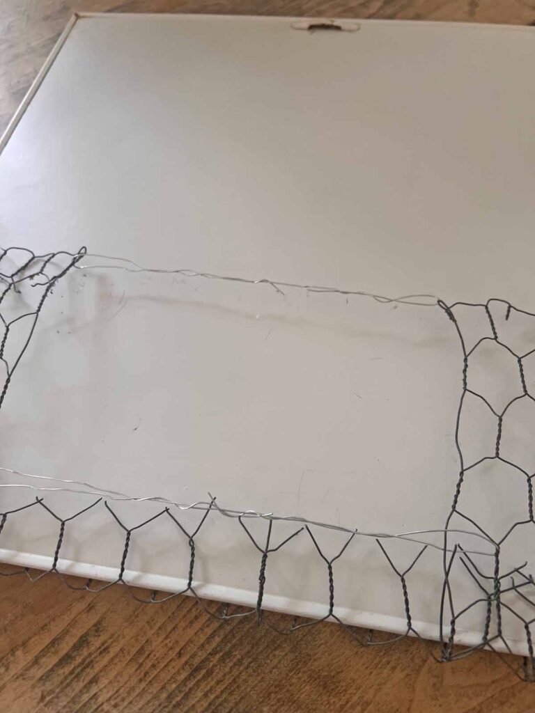 Floral garden metal sign glow-up chicken wire wrapped around backside