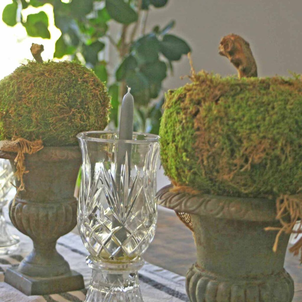 moss pumpkin DIY kitchen table centerpieces in cast iron urns