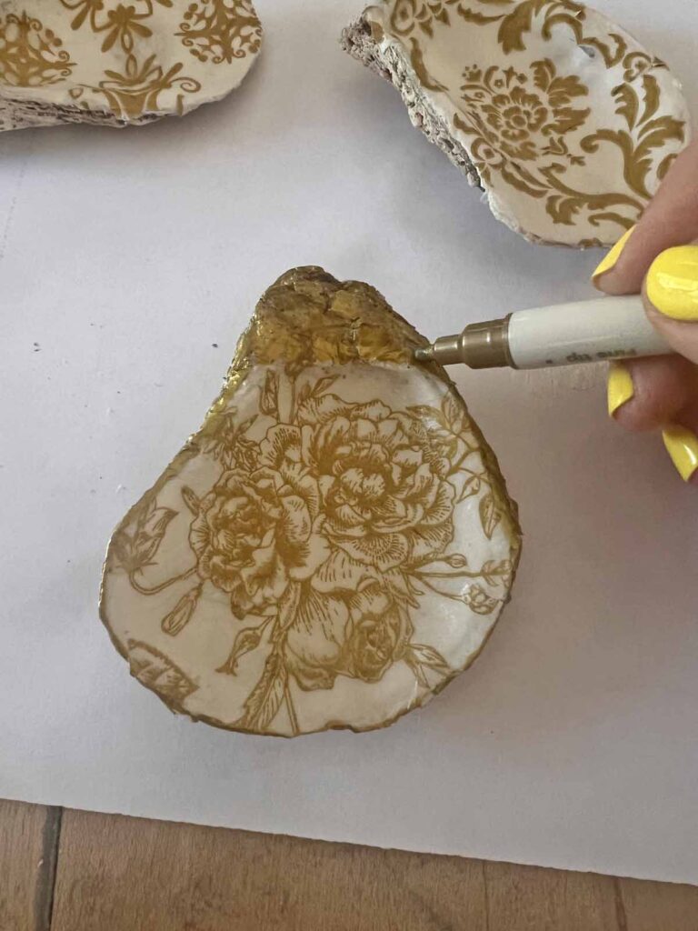 Summer craft: How to decoupage oyster shells into trend forward trinket dishes - gold pen edge