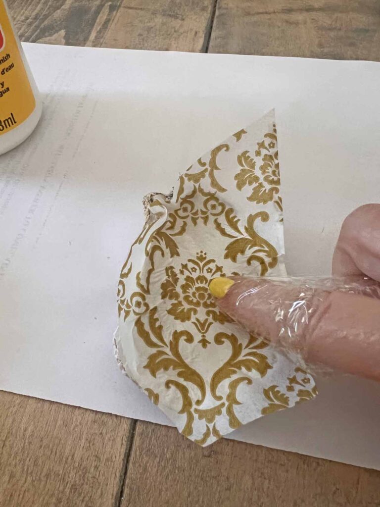 Summer craft: How to decoupage oyster shells into trend forward trinket dishes - cling wrap decoupage application hack