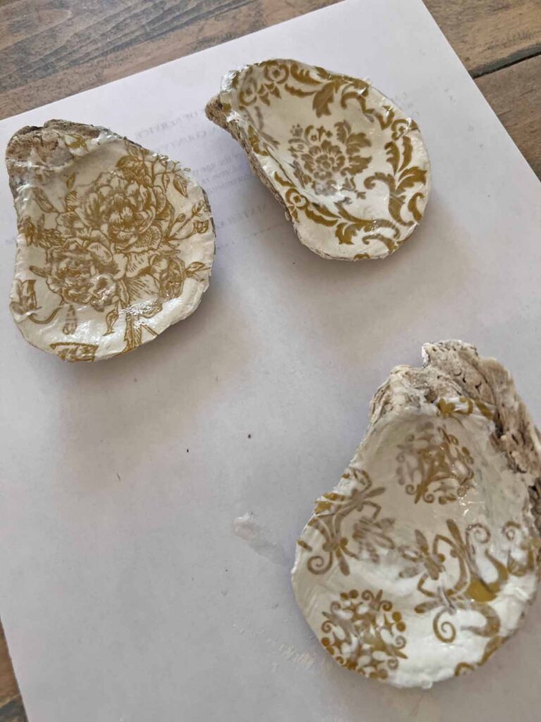 Summer craft: How to decoupage oyster shells into trend forward trinket dishes - napkins sealed with Mod Podge