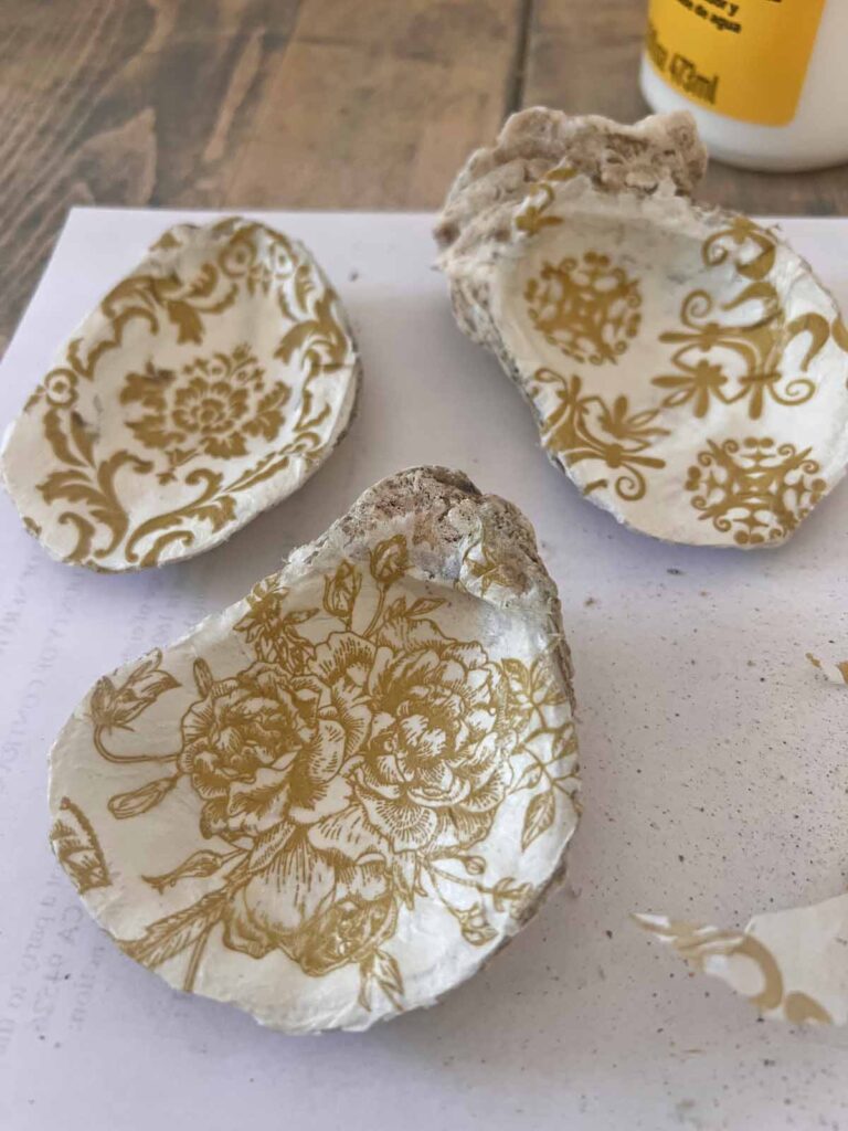 Summer craft: How to decoupage oyster shells into trend forward trinket dishes - napkins sanded to size
