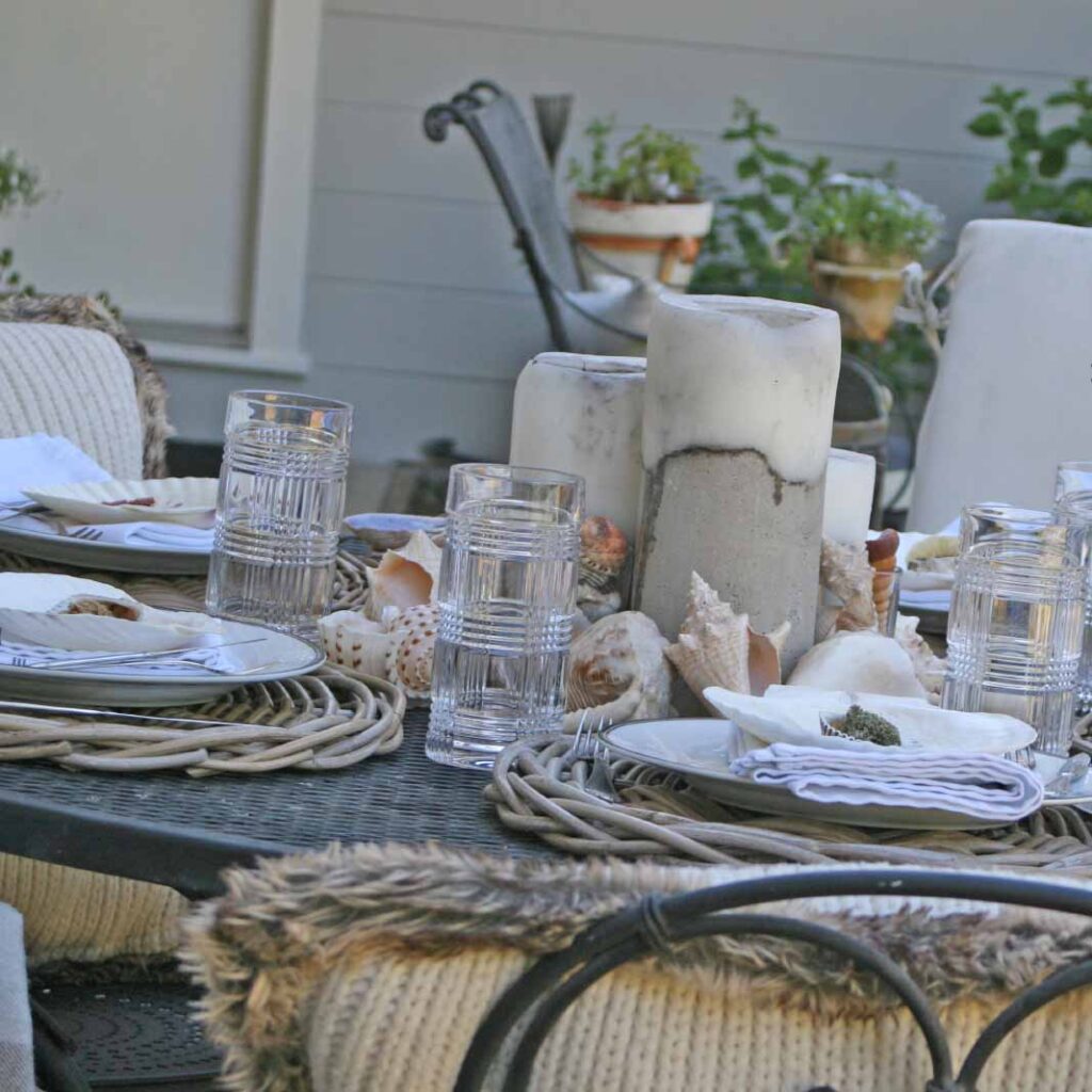 Sea shell tablescape outdoors on back patio