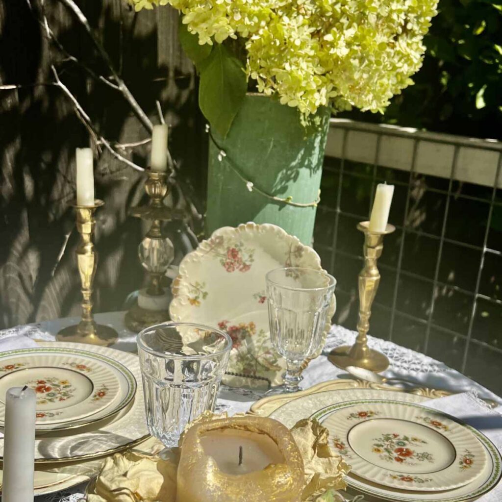Thrifted Fall garden table with Lens dishes feature