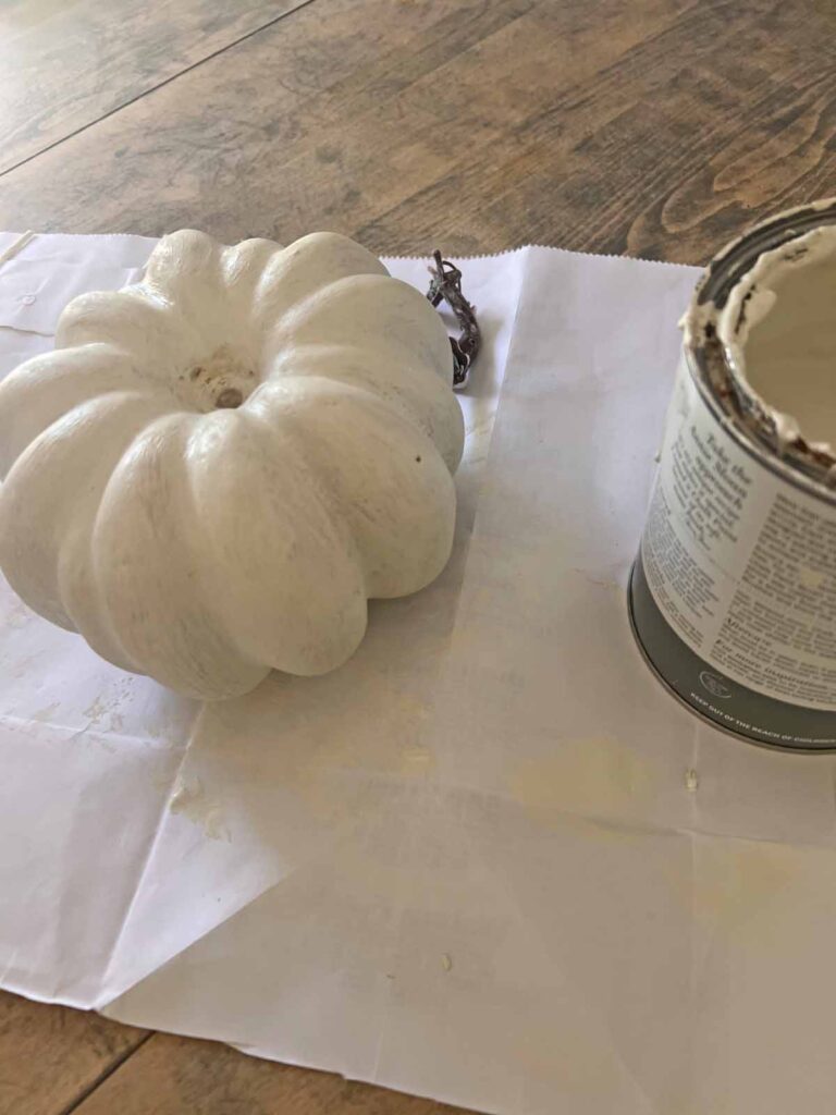 MacKenzie Childs inspired pumpkin dupe DIY striped drying second coat of white paint