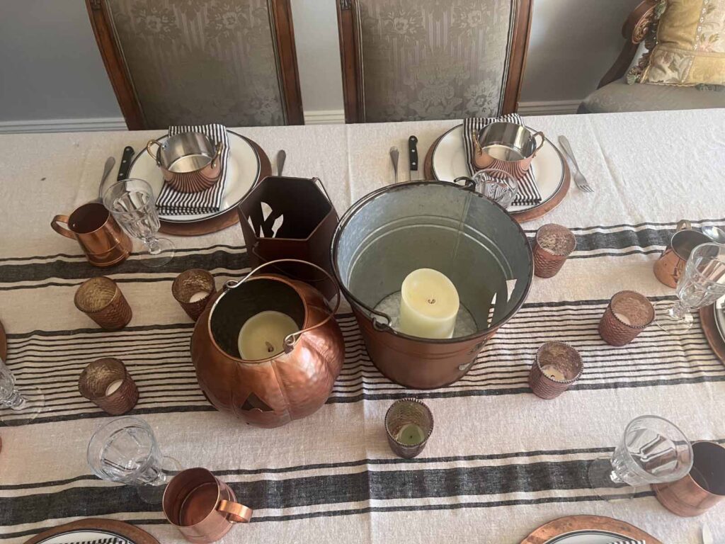 Halloween copper inspired table setting centerpiece shot from above
