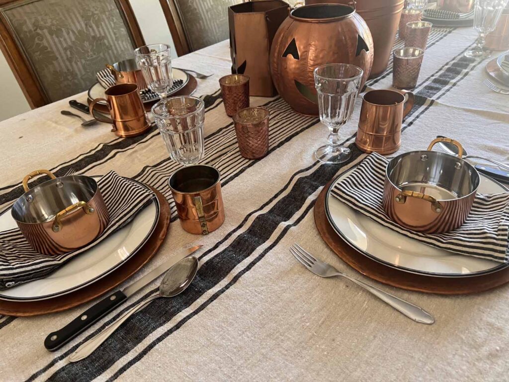Halloween copper inspired table setting plate setting corner of table