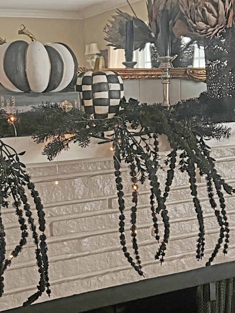 Another Anthropologie Dupe: Cascading black boughs Halloween garland DIY