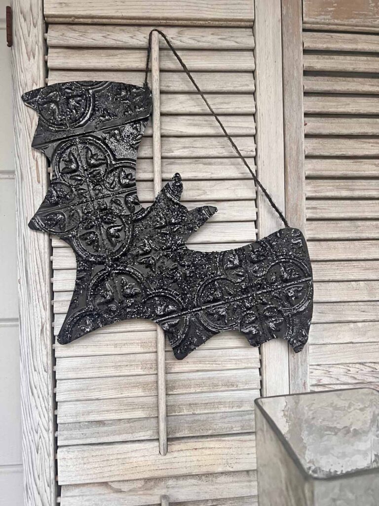 Halloween Decor: Faux tin tile bat DIY on shutter styled