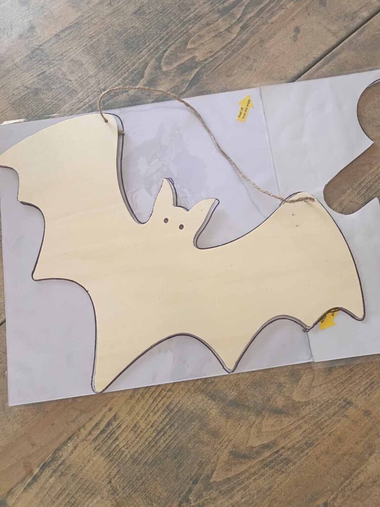 Halloween Decor: Faux tin tile bat DIY drawn bat form on back of tin tile