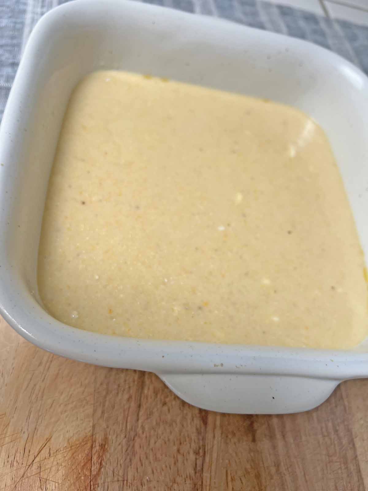 The easiest and most delicious cornbread recipe batter in baking dish
