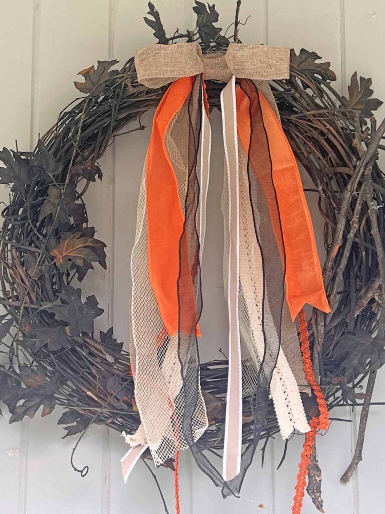 Seasonal Decor: Charming log tailed bow for a Classy Halloween accent