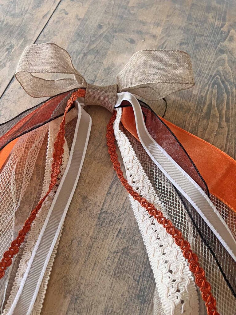 Seasonal Decor: Charming log tailed bow for a Classy Halloween accent complete
