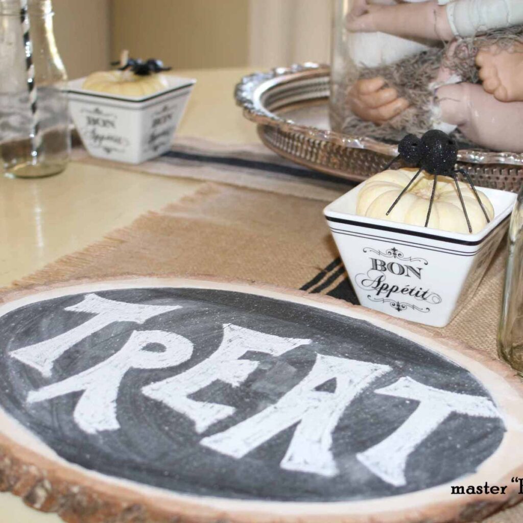 Halloween Whimsical tablescape with chalkboard wood slabs